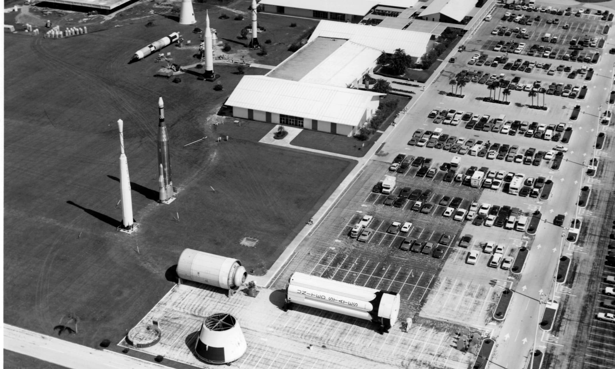 An aerial view of the growing visitors center in 1975. The foundations of the Rocket Garden begin to take shape.