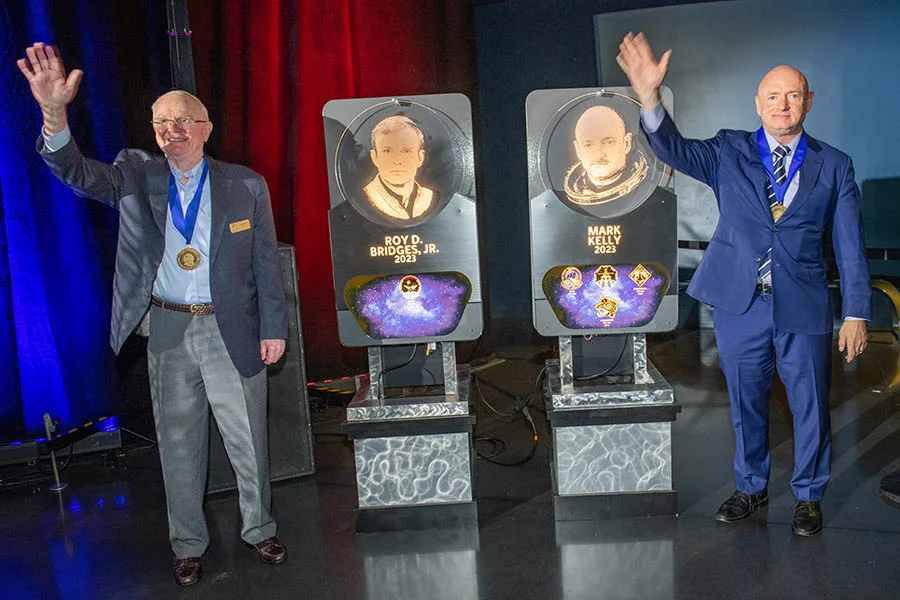 Two astronauts receiving medals