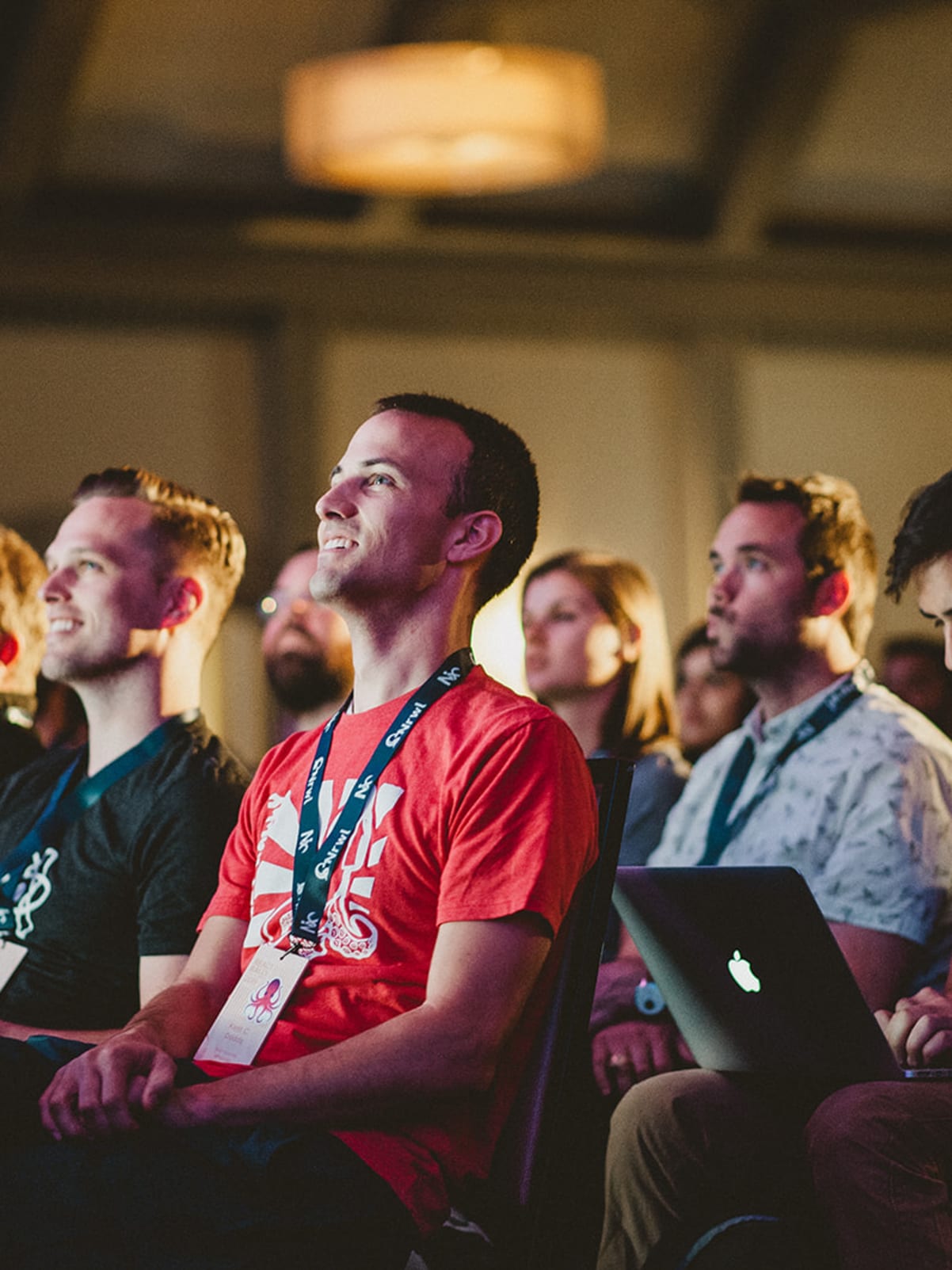 Kent sitting as an audience member at React Rally