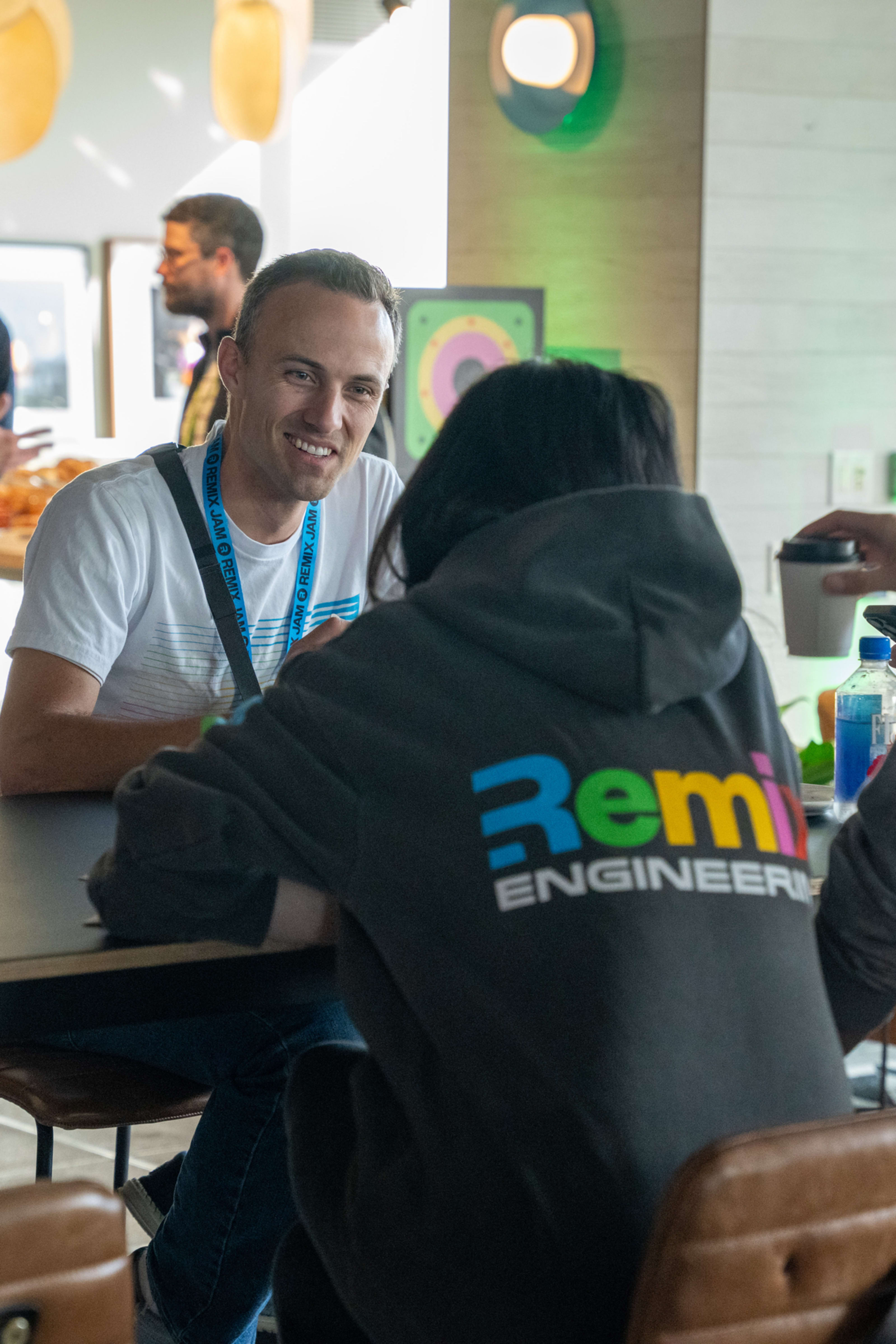 Kent talking with Bei and Jeremiah at Remix Jam