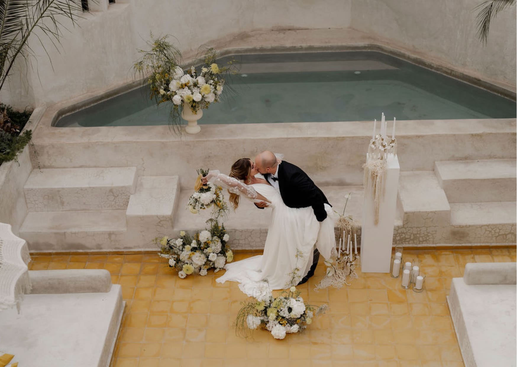 Couple kissing during wedding ceremony