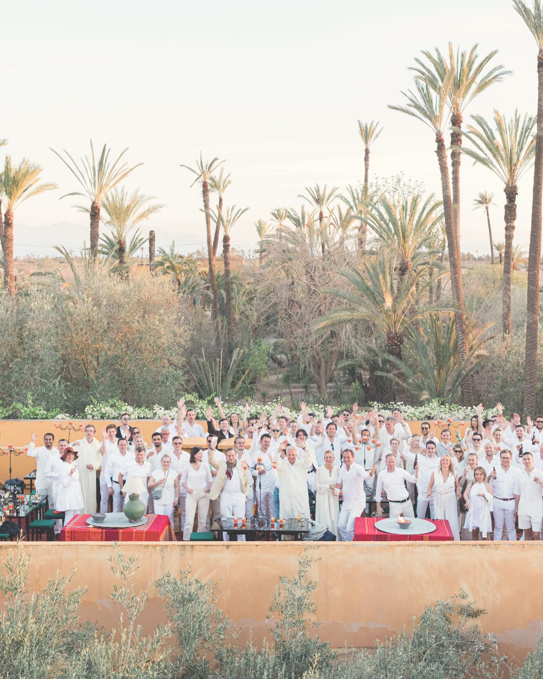 People dressed in white on a rooftop in Marrakech
