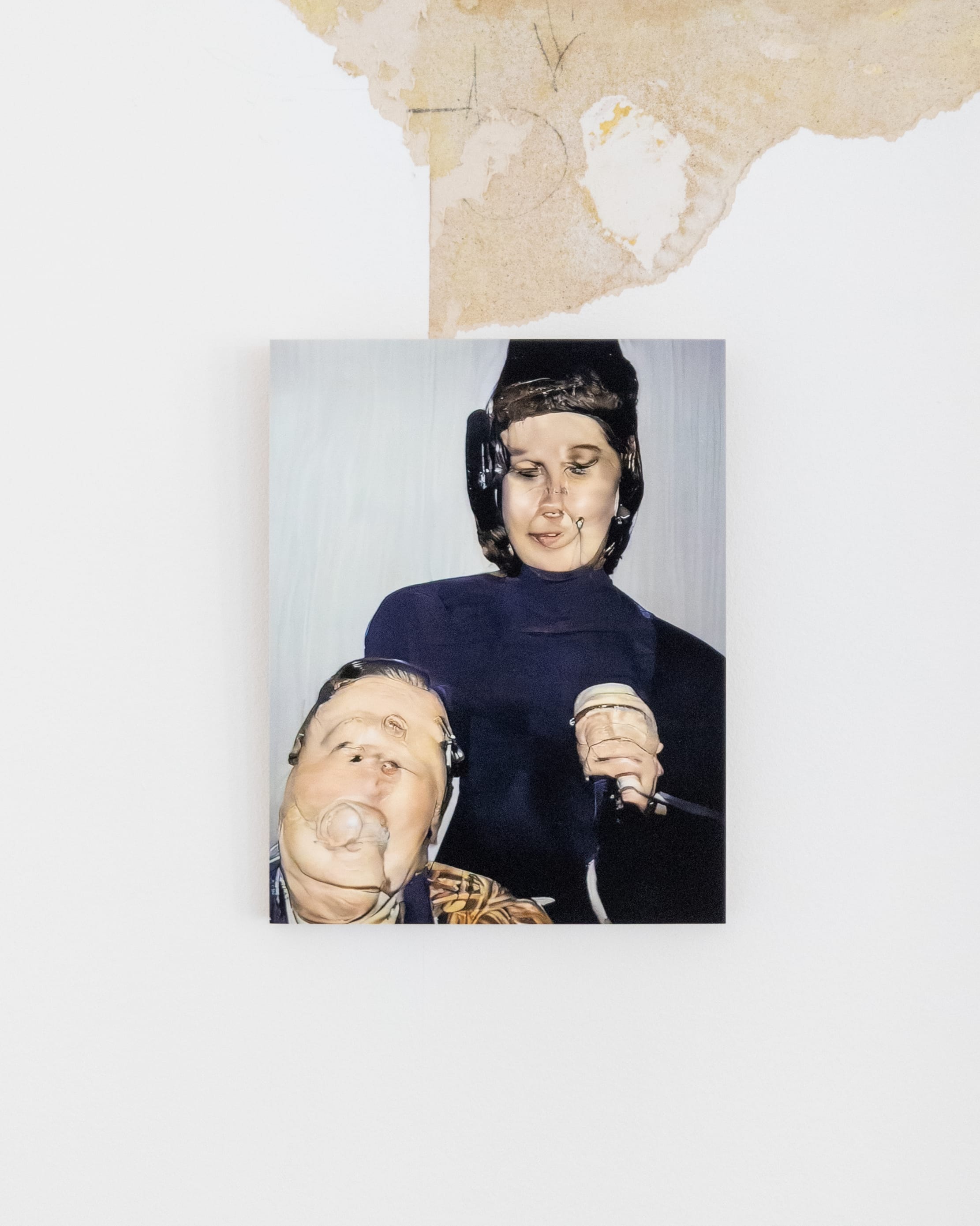Artificially generated photographs from childhood memories, reconstructed from the artist's family video archive