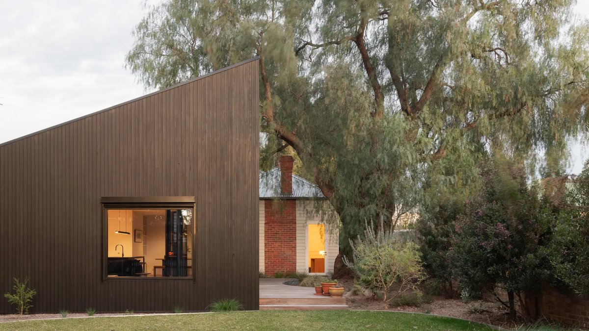 Timber clad extension transforms old home - timber clad extension