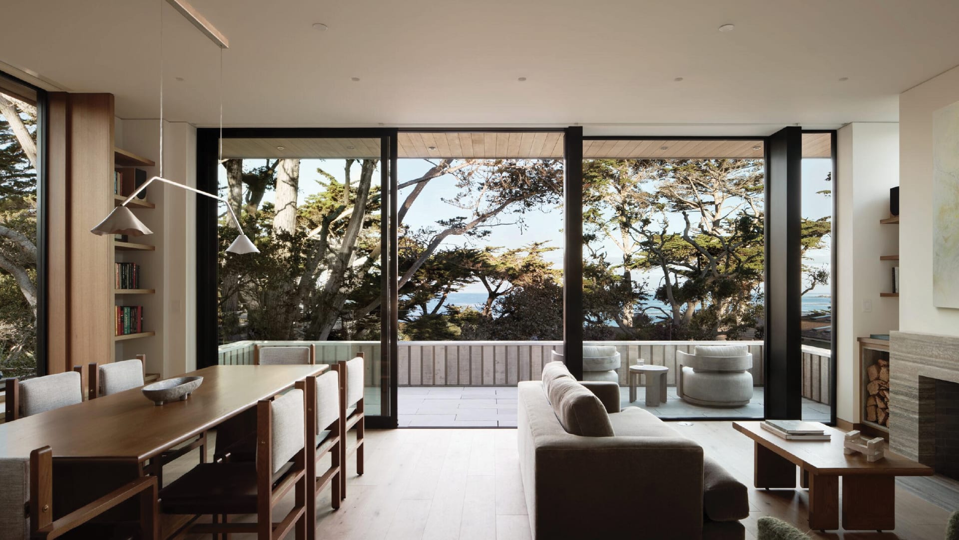 Grid Theory spatial visualization of minimalist coastal residence with sliding timber doors