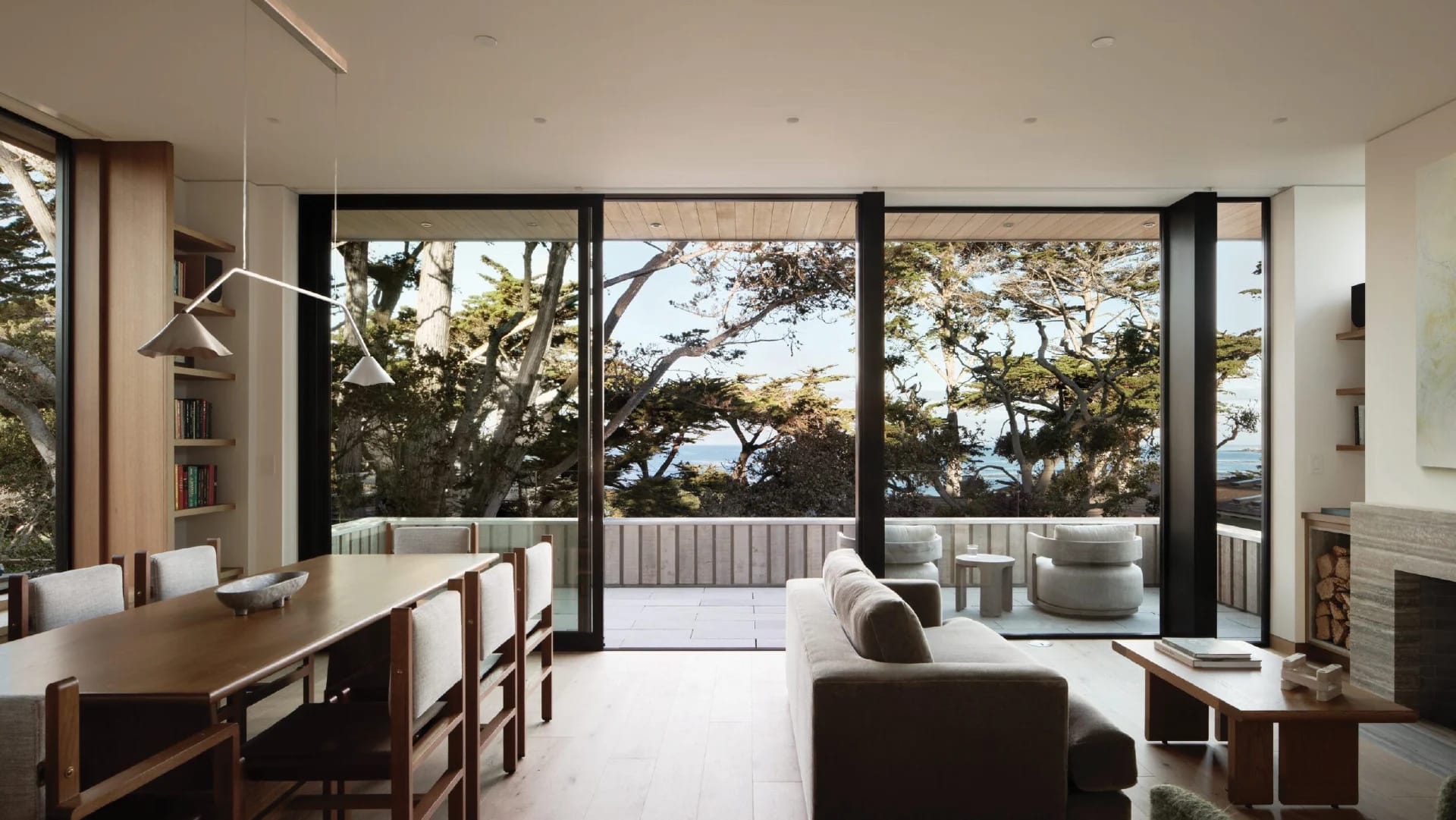 Grid Theory spatial visualization of minimalist coastal residence with sliding timber doors