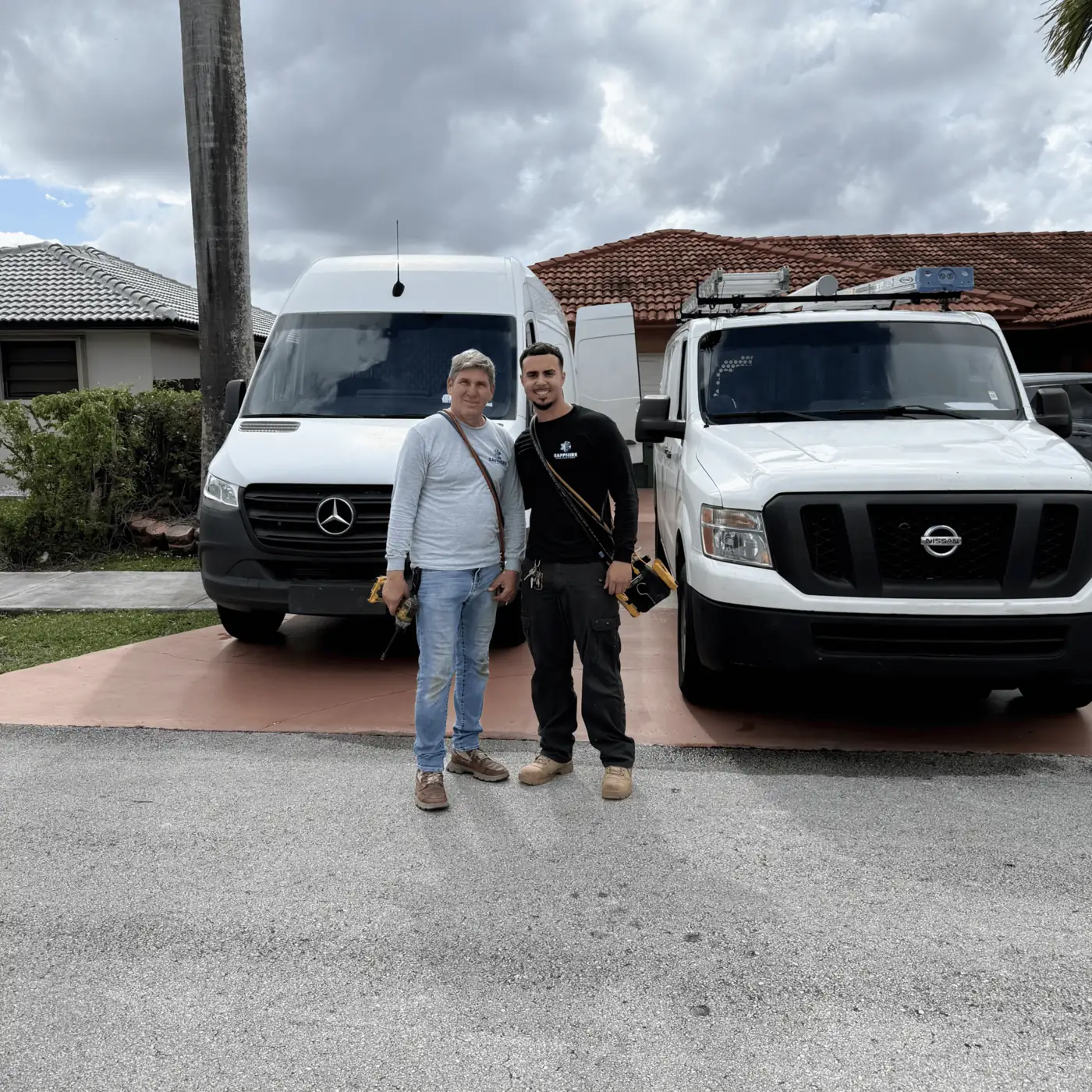 Sapphire HVAC team with service trucks serving South Florida