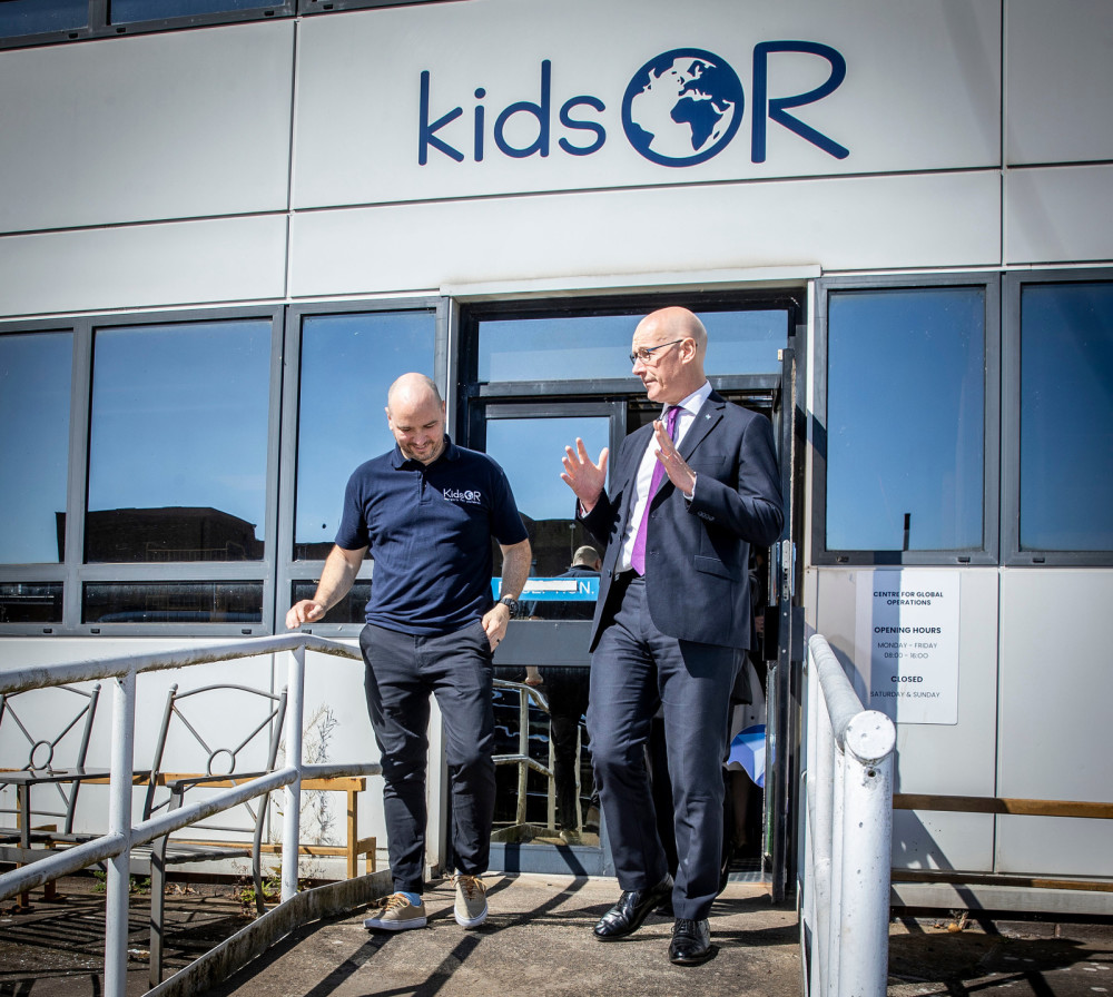 First Minister of Scotland, John Swinney, is shown around our facility by KidsOR Director of Global Operations, Dave Tipping.