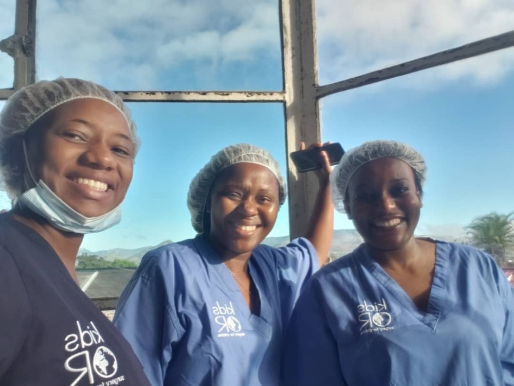 Dr. Precious Mutambanengwe (left) pictured with colleagues at the camp.