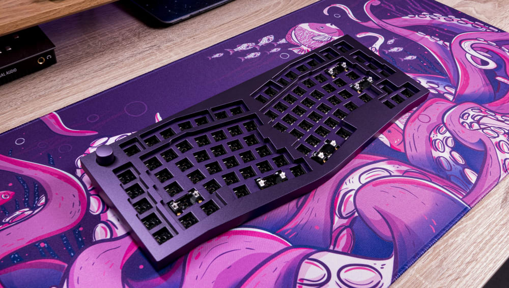 Purple Keychron Q10 with Octopus Desk Mat
