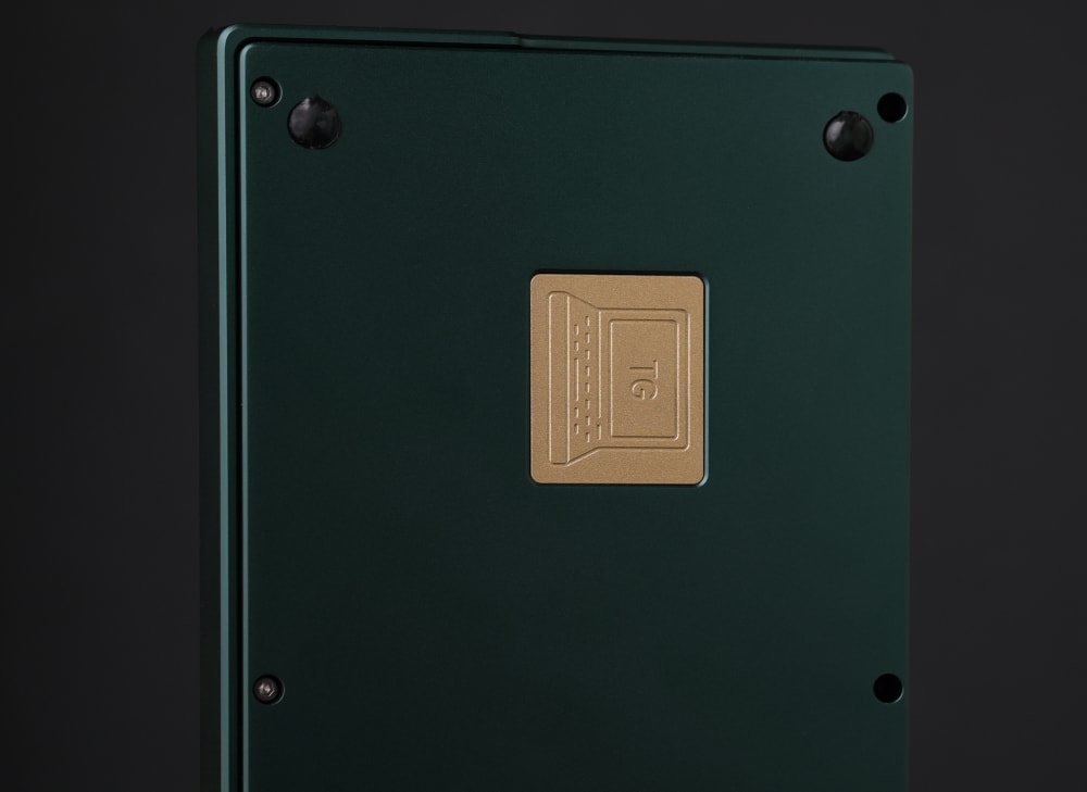 Brass Badge on the Dark Green TG67 V3