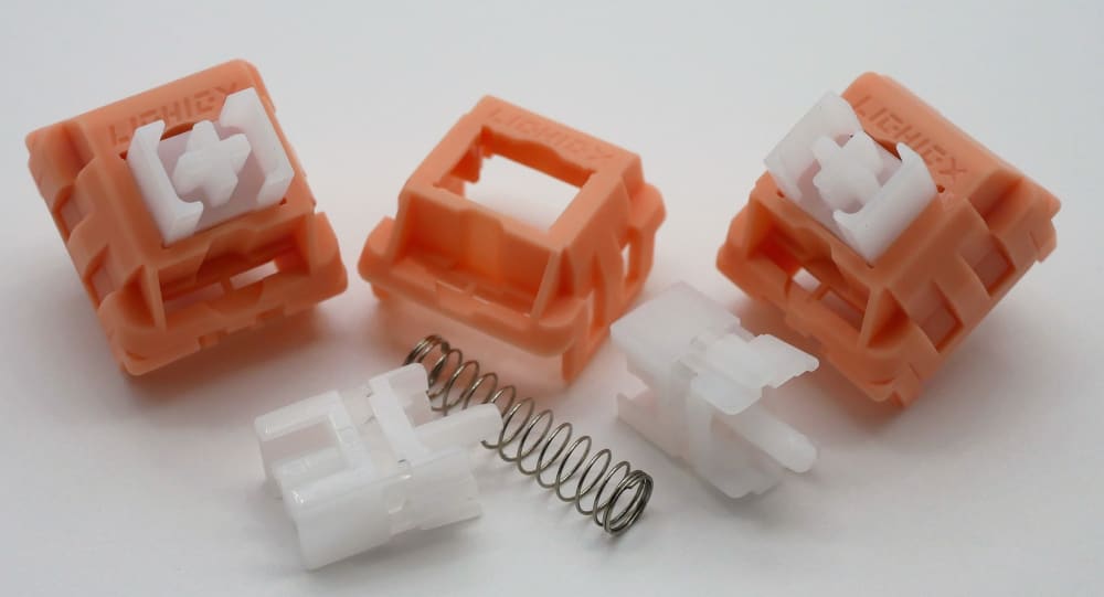 LCHICX-made HAPE Orange switches. Only 10,000 ever were made and their innovative silencing mechanism helped propel LICHICHX's brand popularity sky high.