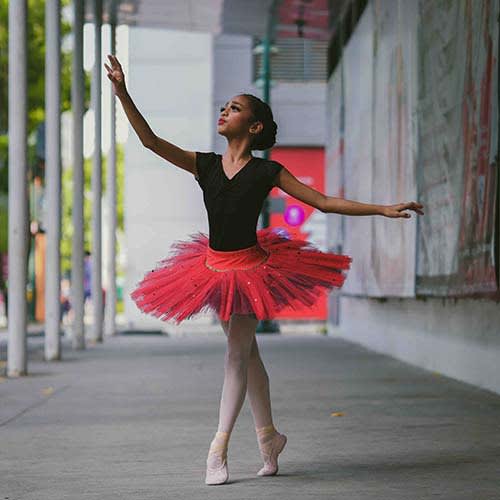 woman dancing ballet outdoors