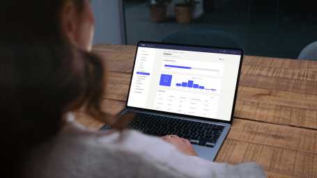 Person using proptech on their laptop