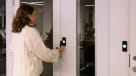Person using the latest security tech to unlock a door