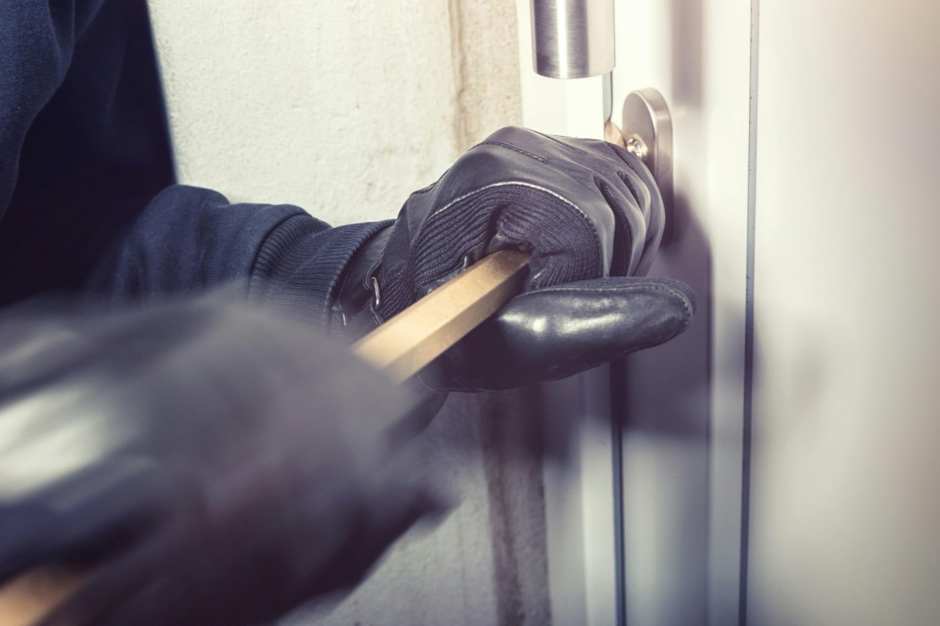 person trying to force entry into a business with no commercial security system installed