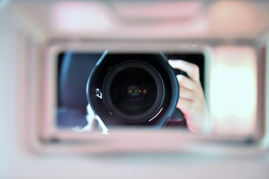 an image showing a camera recording through a hole