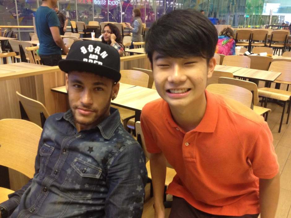 An image of Kisi's Backend Developer Intern, Stuart with world-famous footballer Neymar