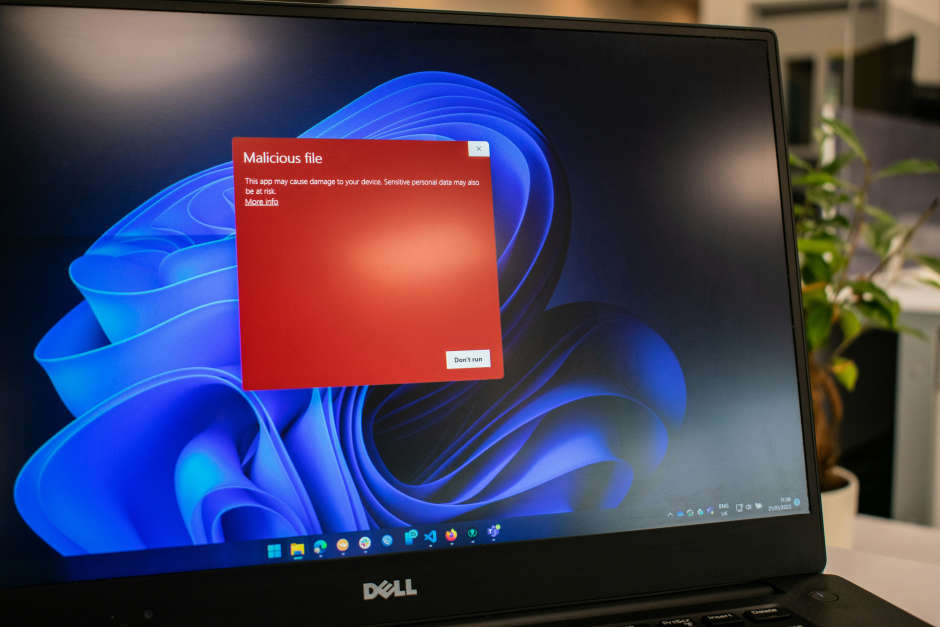cyber security technology installed on a laptop alerting the user of cyber threats