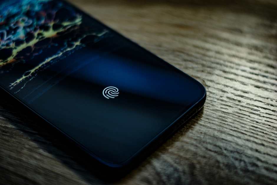 mobile phone asking for a fingerprint as a biometric authentication security tech offers