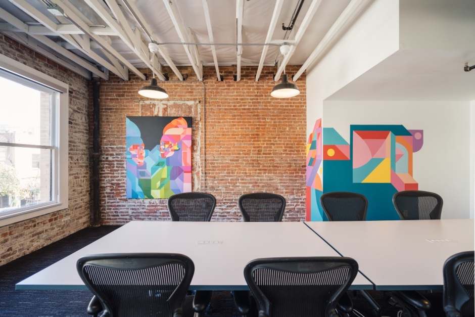 An image from working space in FoundrSpace with inspiring art on the walls