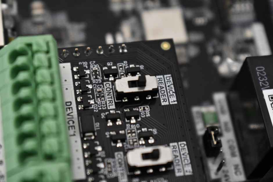 An image showing Kisi's Wiegand board connected to the scanner and set to ‘Reader’