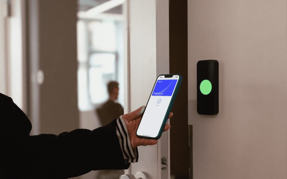 commercial door unlocked with employee badge in Apple Wallet