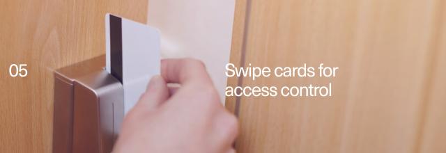Person swiping a keycard