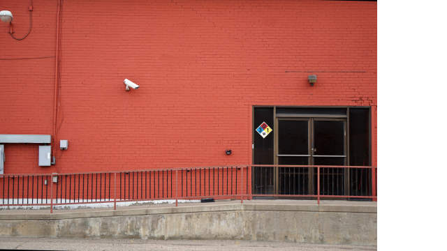 security camera in front of a business entrance
