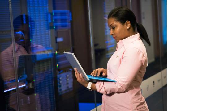 Security integrator in front of a server room