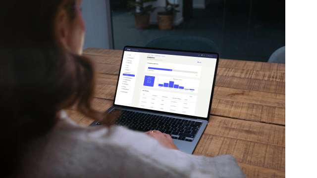 Person using proptech on their laptop