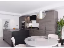 edge luxe kitchen in denver oak with dining table