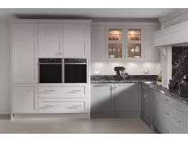 Dust Grey and Dove Grey Milborne tall kitchen cabinets with integrated appliances