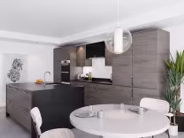 edge luxe kitchen in denver oak with dining table
