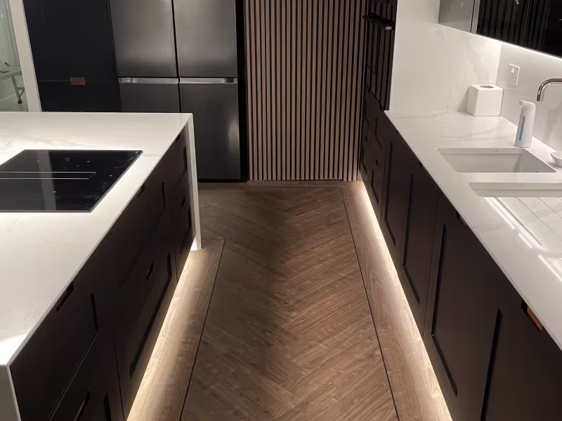 under cabinet lighting with herringbone floor