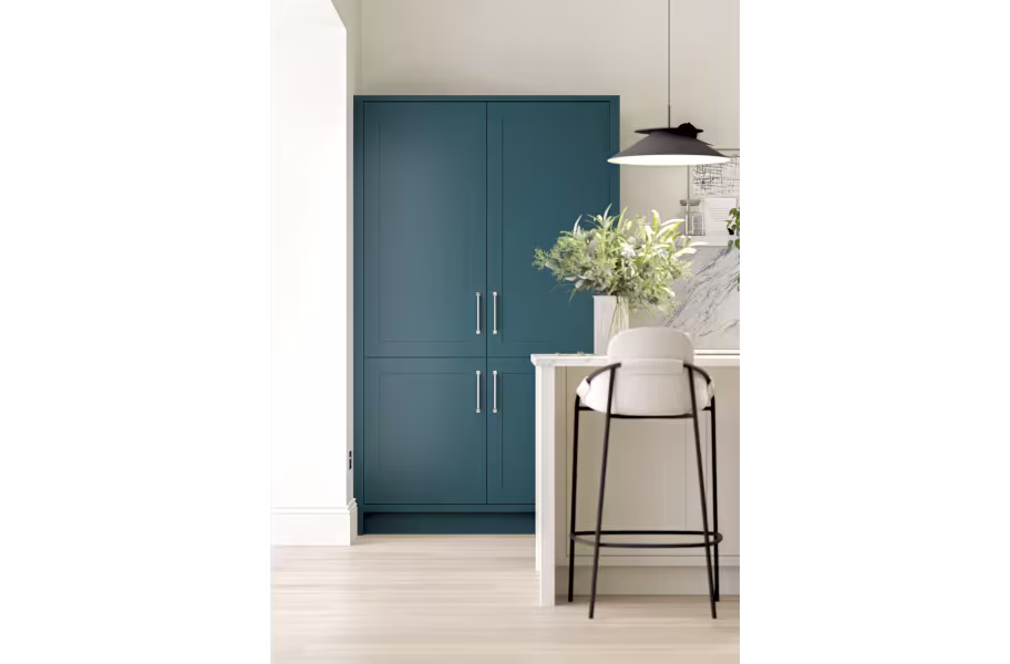Hunton Majestic Teal and Dove Grey Shaker kitchen tall cabinets with integrated appliances and kitchen island with breakfast bar