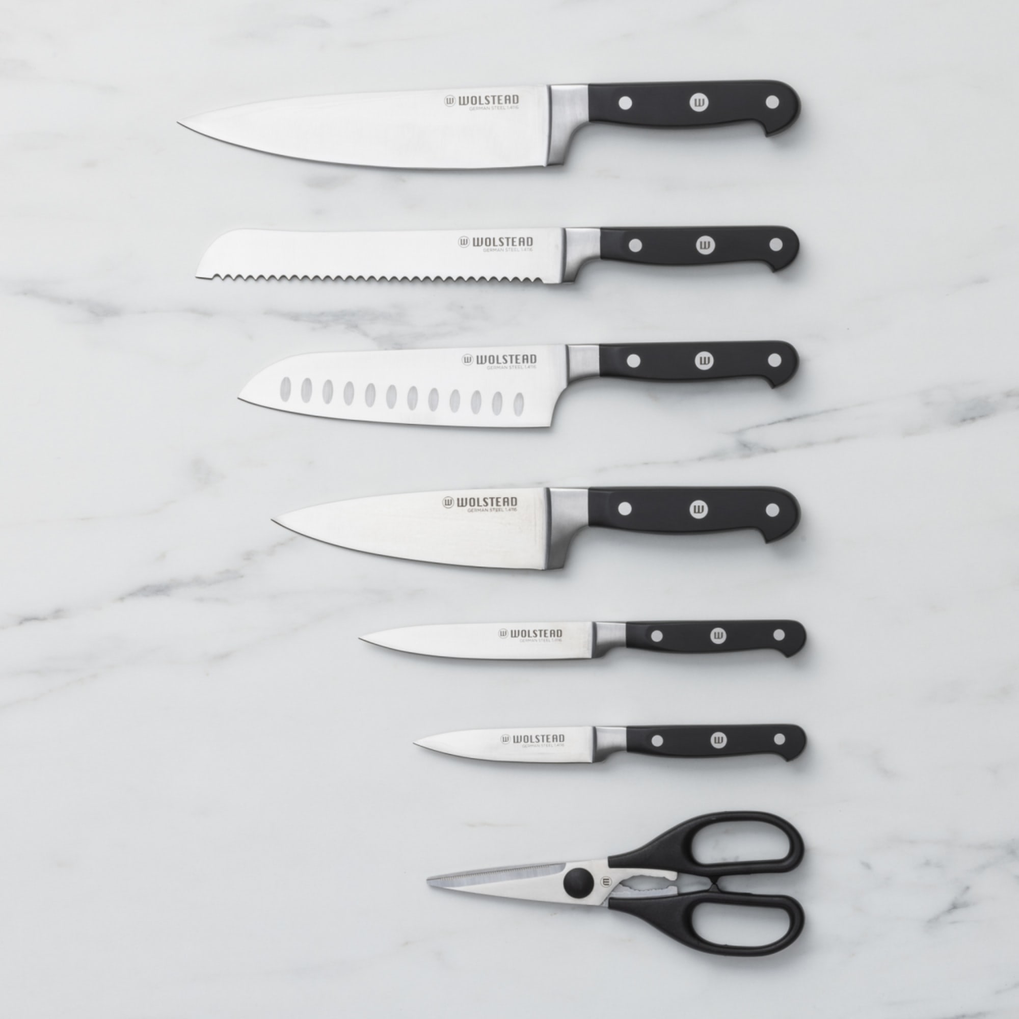 https://res.cloudinary.com/kitchenwarehouse/image/upload/c_fill,g_face,w_1250/f_auto/t_PDP_2000x2000/Kitchen%20Warehouse%20Images%20/Wolstead-Calibre-8pc-Knife-Block-D.jpg