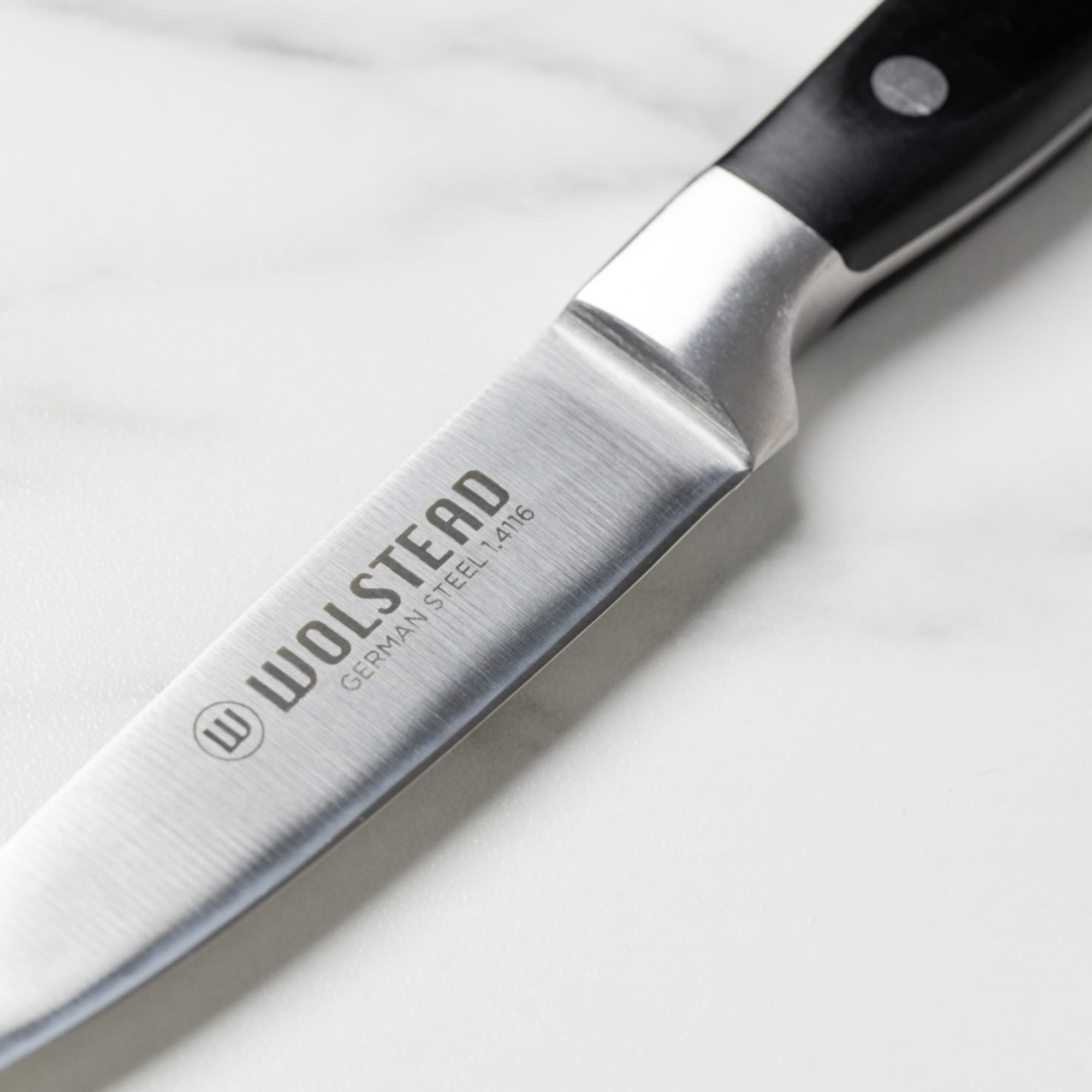 https://res.cloudinary.com/kitchenwarehouse/image/upload/c_fill,g_face,w_1250/f_auto/t_PDP_2000x2000/Kitchen%20Warehouse%20Images%20/Wolstead-Calibre-Paring-Knife-9-5cm-HDP_1.jpg