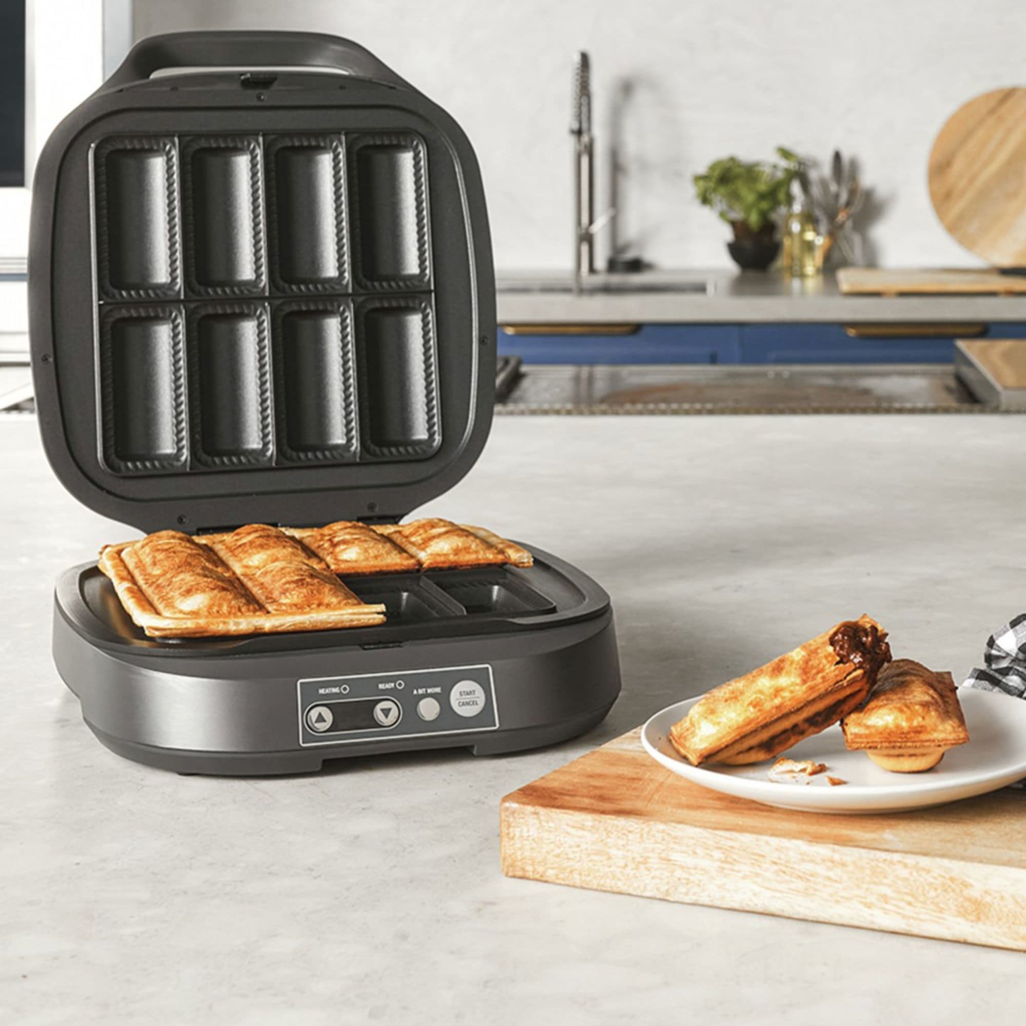 https://res.cloudinary.com/kitchenwarehouse/image/upload/c_fill,g_face,w_1250/f_auto/t_PDP_2000x2000/Supplier%20Images%20/2000px/Breville-the-Quick-and-Easy-Pie-Maker_4_2000px.jpg?imagetype=pdp_full