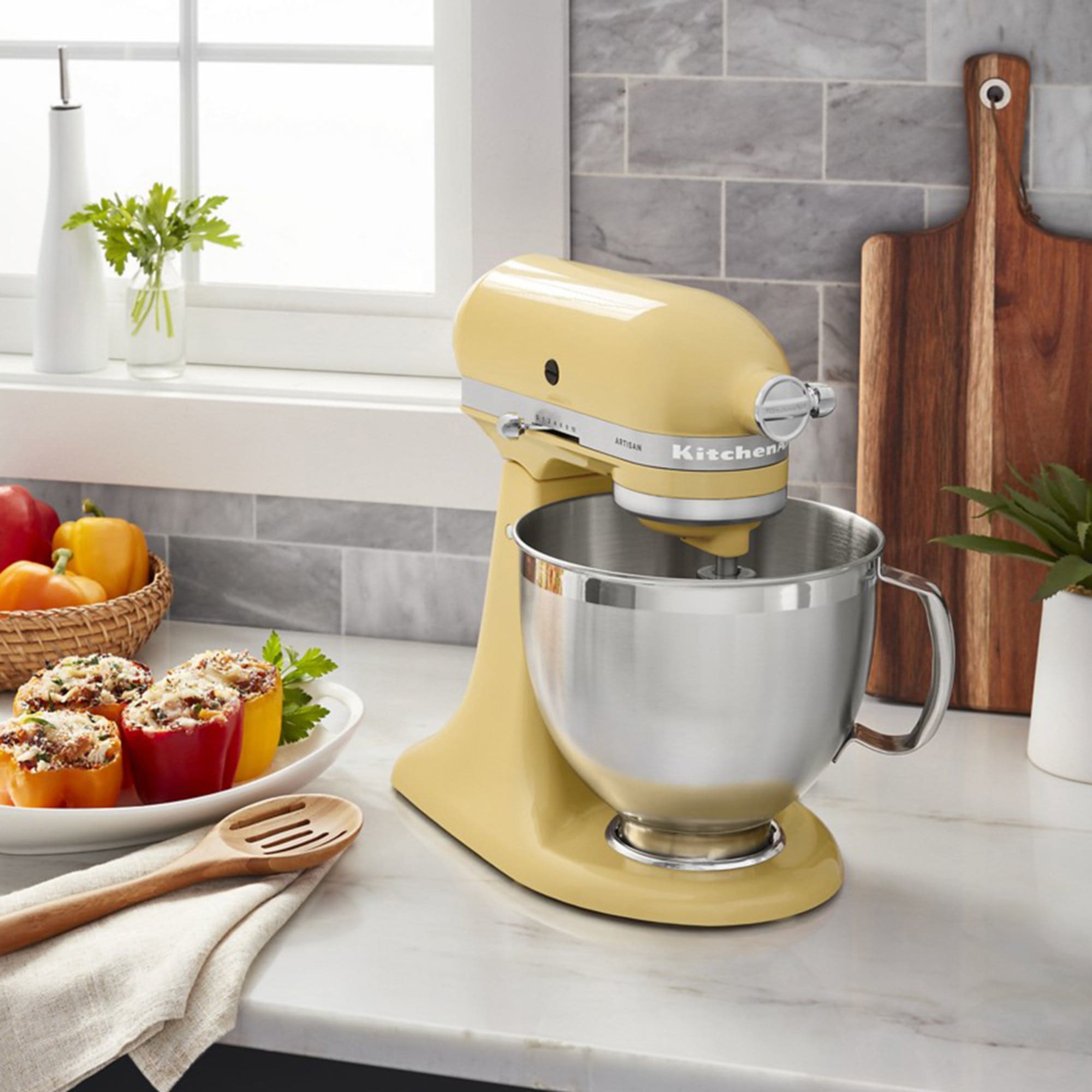 https://res.cloudinary.com/kitchenwarehouse/image/upload/c_fill,g_face,w_1250/f_auto/t_PDP_2000x2000/Supplier%20Images%20/2000px/KitchenAid-Artisan-KSM195-Stand-Mixer-Majestic-Yellow_5_2000px.jpg?imagetype=pdp_full