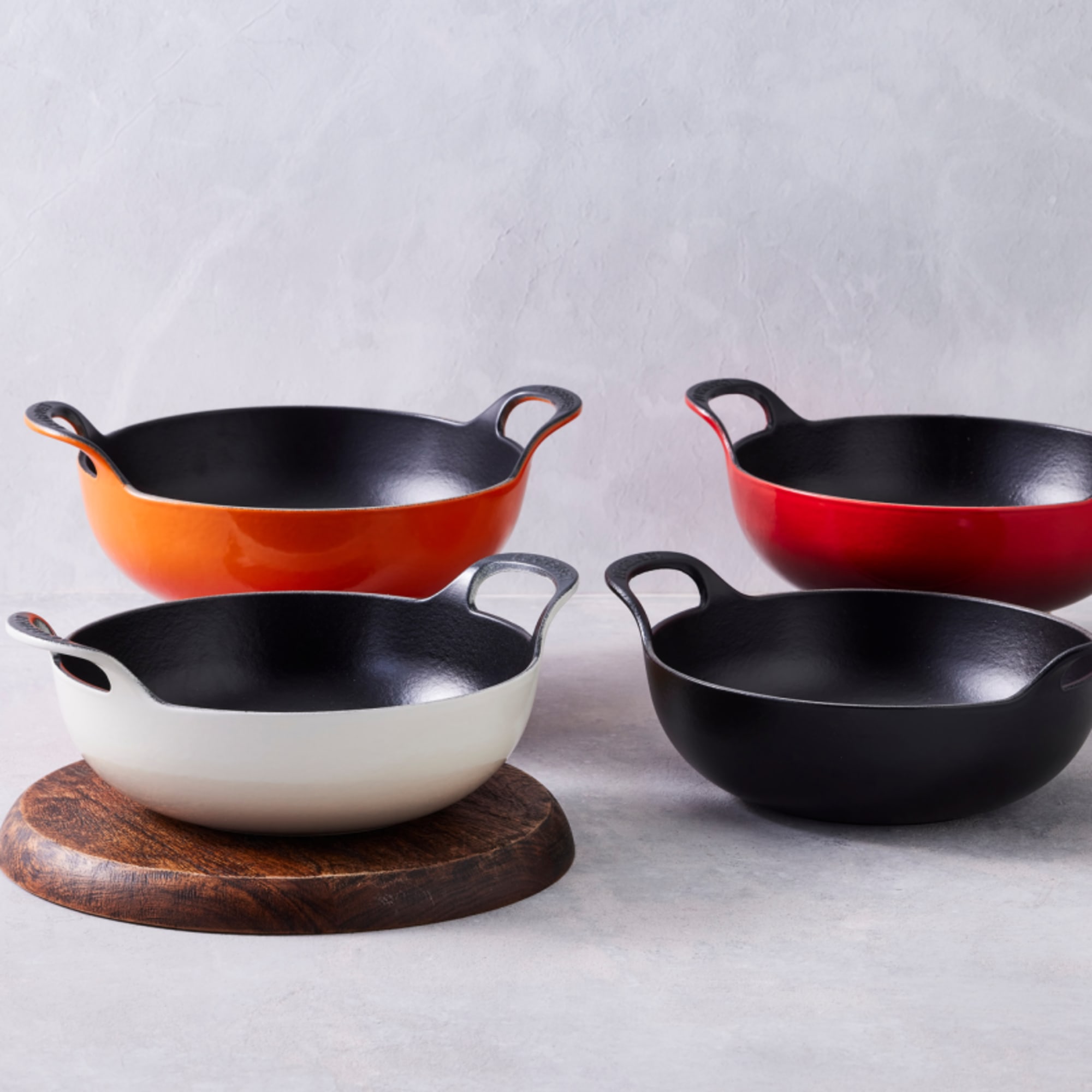 https://res.cloudinary.com/kitchenwarehouse/image/upload/c_fill,g_face,w_1250/f_auto/t_PDP_2000x2000/Supplier%20Images%20/Supplier%20Product%20Assets/Le-Creuset-Satin-Black-20142240000460_CI_Balti_Dish_24cm_Satin_Black_LS_003.jpg?imagetype=pdp_full