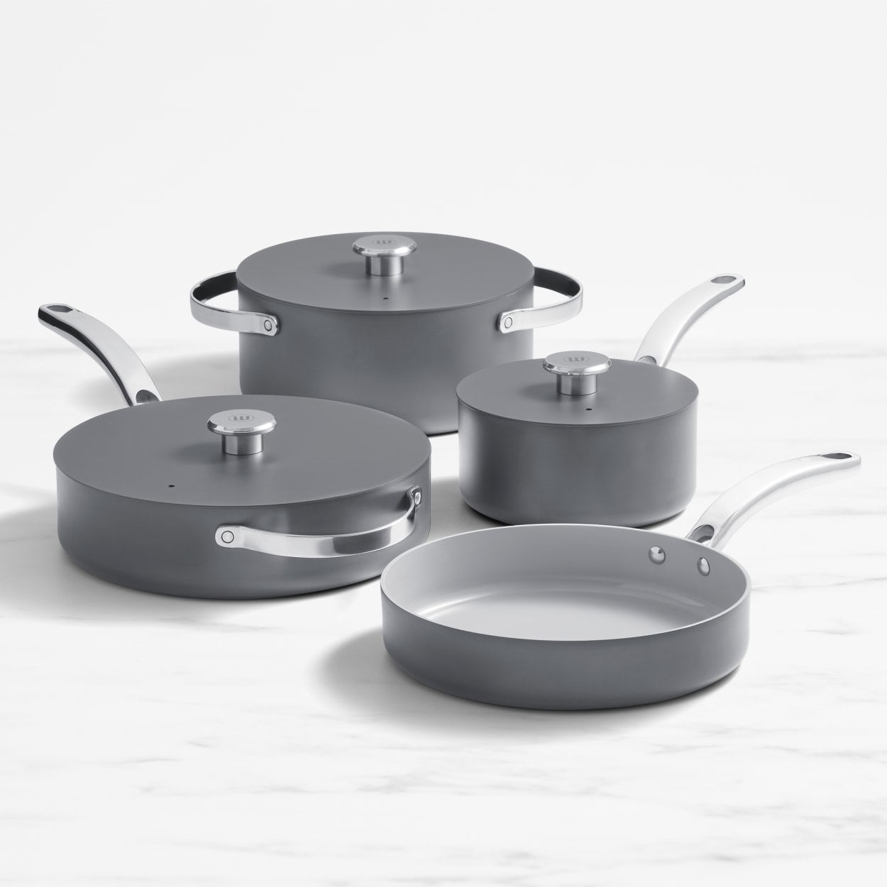 https://res.cloudinary.com/kitchenwarehouse/image/upload/c_fill,g_face,w_1250/f_auto/v1699249159/Kitchen%20Warehouse%20Images%20/Wolstead-Mineral-4pc-Cookware-Set-Grey-HERO_01.jpg