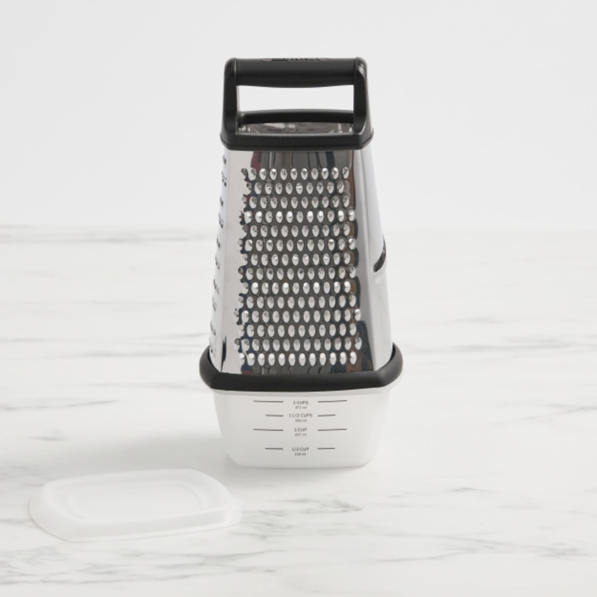 https://res.cloudinary.com/kitchenwarehouse/image/upload/c_fill,g_face,w_625/f_auto/t_PDP_2000x2000/Kitchen%20Warehouse%20Images%20/Kitchen-Pro-Ergo-Etched-Box-Grater-H_2.jpg
