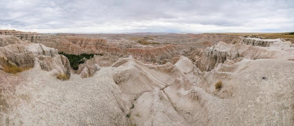 Pale eroded spires and gullies stretching away from the Pinnacles Overlook in Badlands National Park