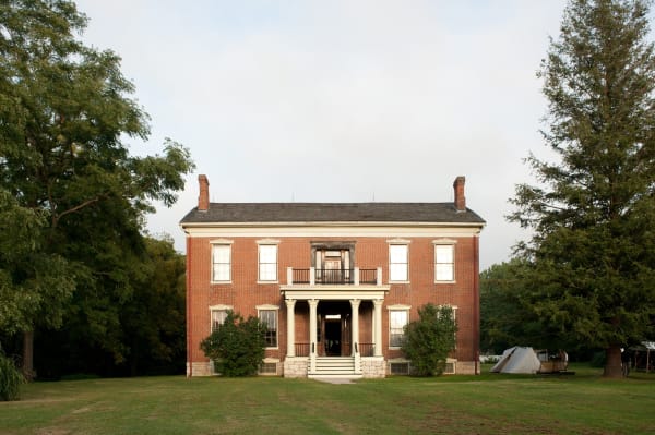 The red brick Anderson House on its lawn at the Battle of Lexington State Historic Site.