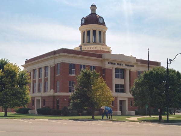 The red brick Beckham County Courthouse in Sayre with its domed clock tower.