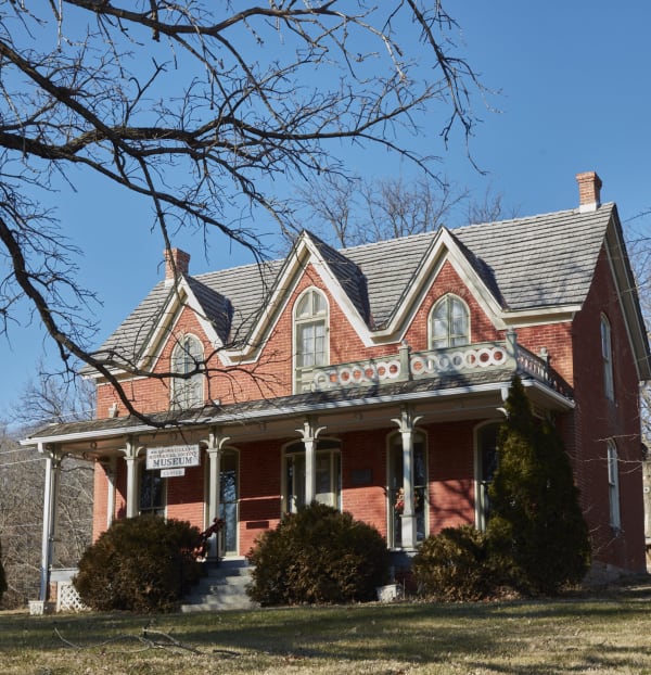 The 1877 Captain Bailey House in Brownville, a red-brick Gothic Revival house with steep gables, now the village historical museum.