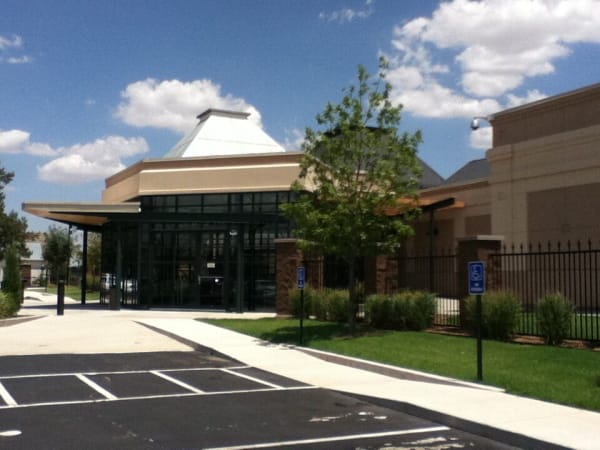The glass entrance of the Cherokee Strip Regional Heritage Center in Enid.