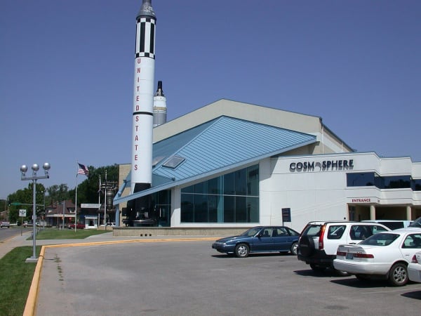 A white rocket marked United States stands upright beside the Cosmosphere building in Hutchinson.
