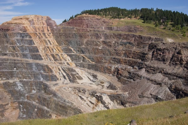 The terraced, rust-streaked walls of the Homestake open cut at Lead